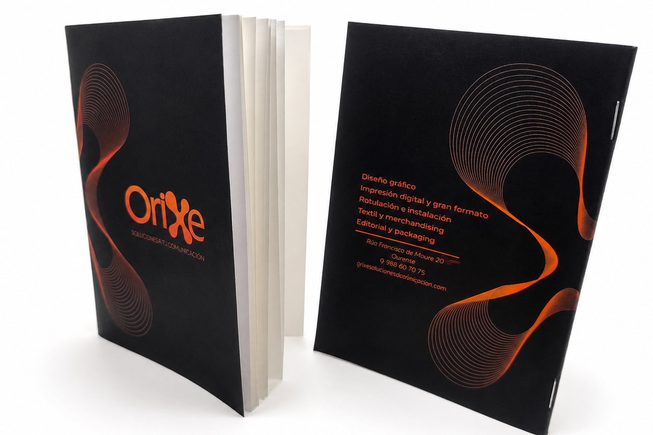 Libretas corporativas de Orixe Publicidade con nueva identidad visual en negro y naranja
